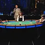 Final table heads-up event #52, PokerNews bloggers back left