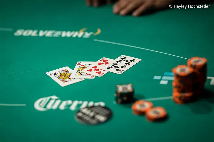 Omaha poker hand at the table
