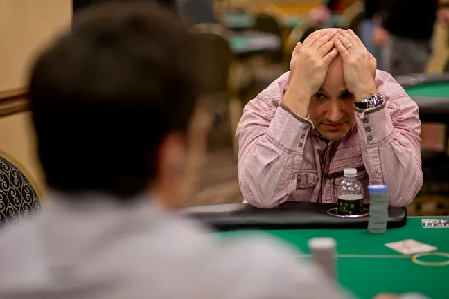 Vince Baldassano reacts to the all-in river shove by Chris Klodnicki (foreground)