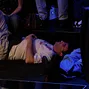 Mike Matusow naps besides the final table