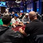 Poker room, tables, crowd