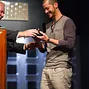 Athanasios Polychronopoulos accepting his bracelet from Nolan Dalla