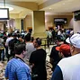 Scores of people lining the hallway to register for Event 6B, "Millionaire Maker"