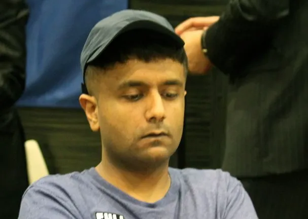 Bansi looks down at his flop bet.
