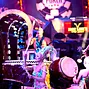 Cirque du Soleil drummers perform on the ESPN Final Table stage