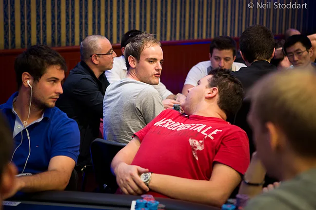 Shaun Deeb leans back to chat with Pius Heinz on Day 2