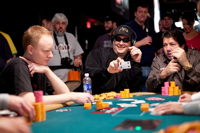 Phil Hellmuth shows Jon Turner the 4 of clubs, thus busting him out of the tournament.