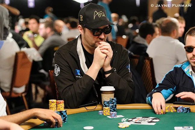 Phil Hellmuth is down to 12 big blinds.