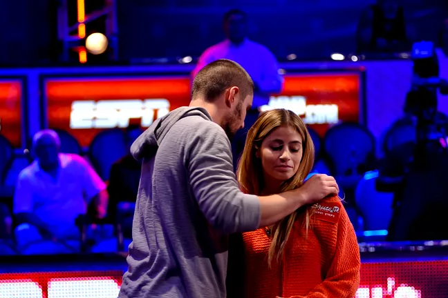 David Sands gives girlfriend, Erika Moutinho, a hug after he busted out in 30th place from the Main Event