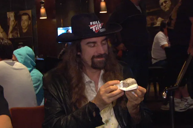 Chris Ferguson snacking on a Lamington