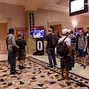 Players waiting for the doors to the Amazon Room to open
