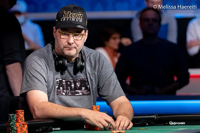 Phil Hellmuth in earlier WSOP action w/ his headphones