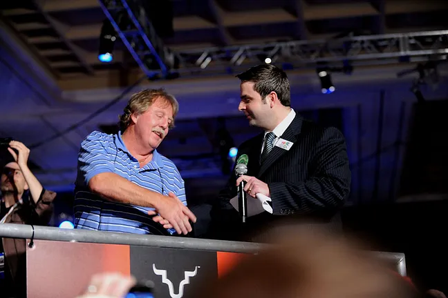 Tim McDonald receives a comped buy-in for the 2011 WSOP Main Event from Jack Effel