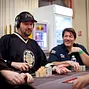 Phil Hellmuth and David Benyamine in some table chatter