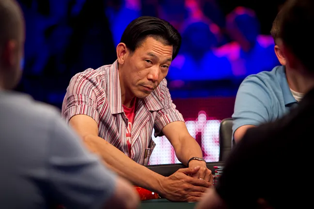 Minh Ly takes a big pot from Brian Rast.