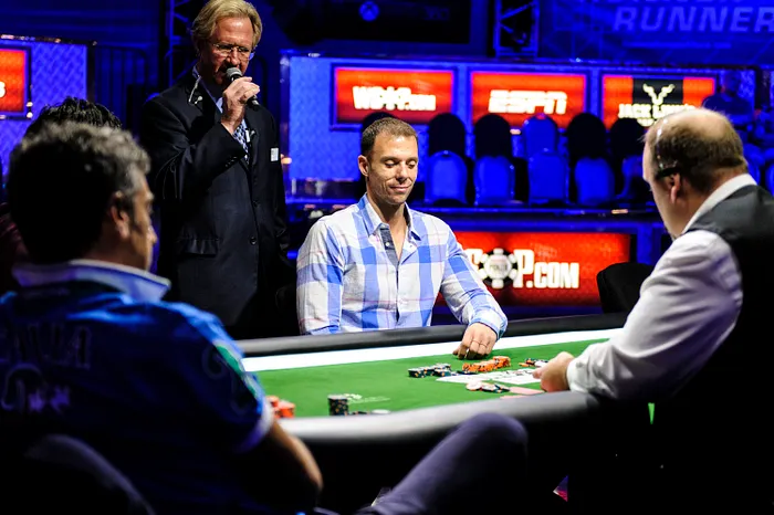 Matt Berkey smiles seeing the flop as he is all in vs Antonio Buonanno