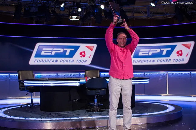 Vitaly Lunkin holds his €50k Super High Roller trophy aloft