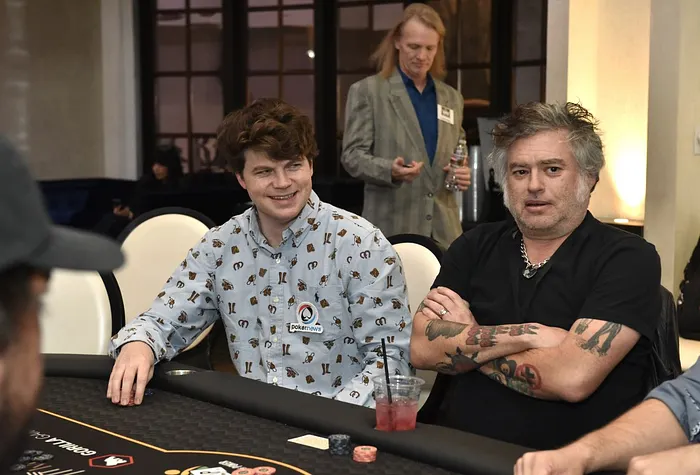 PokerNews' Connor Richards and Fat Mike at the poker table