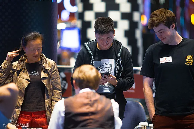 Michael Fu (centre) getting aces cracked