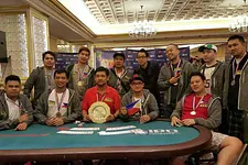 Team Poker King Club-Pilipinas with PKC president and CEO Winfred Yu during the awarding ceremony of the International Poker Ope