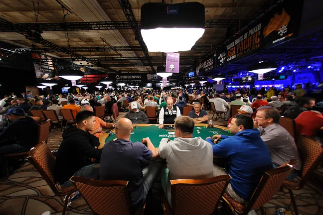 Players pack the Amazon Room.