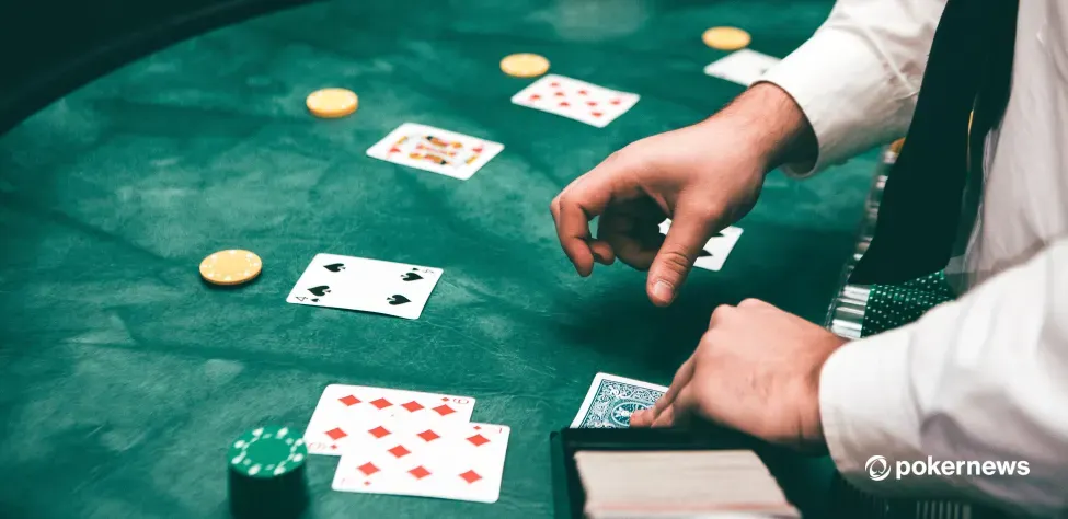 Blackjack dealer dealing a hand