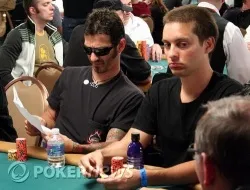 Sully Erna (left) checks the payout sheet while sitting next to Tobey Maguire