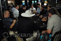 Action from the floor of the Empire Casino.  Can you guess who is under the hat?