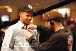 Ivey gets miked up for his match against Johnny Chan