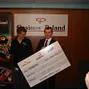 Peter Jepsen with a BIG cheque (or check!)