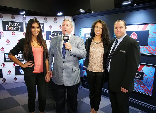 Mike Sexton is joined by Royal Flush Girls Tugba Ercan (left) and Brittany Bell, along with Martin Roy.