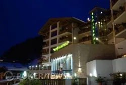 The Alpine Palace Hotel by night
