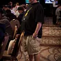 David Bach gets a little stretch in while playing the Main Event on day 3. Looks like he's sportin' Dearfoams as well.