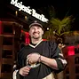 Phil Hellmuth out side the Majestic Barriere