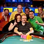 Andy Bloch and friends celebrate his bracelet win in Event 7.