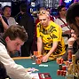 Max Heinzelman passes some of his chips over after losing an all in call.