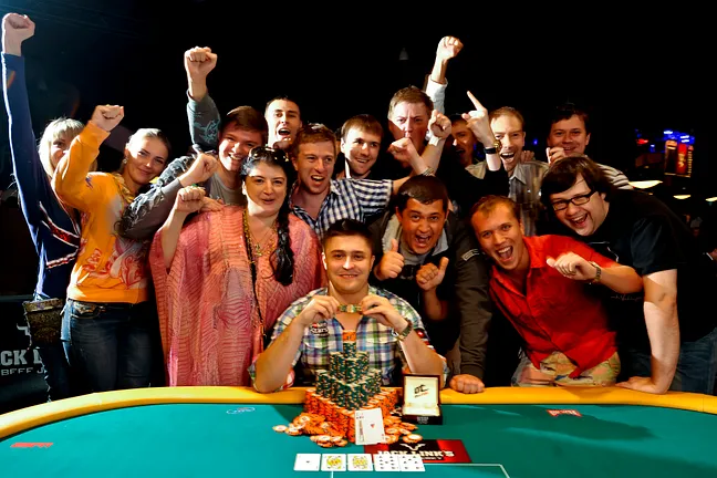 Event 54 bracelet winner Maxim Lykov and supporters.