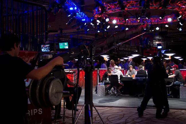 The ESPN crew surrounds the secondary feature table.