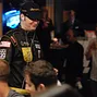 Phil Hellmuth arriving at his table