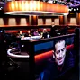 Juan Manuel Pastor on the TV screen with the final table stage in the background