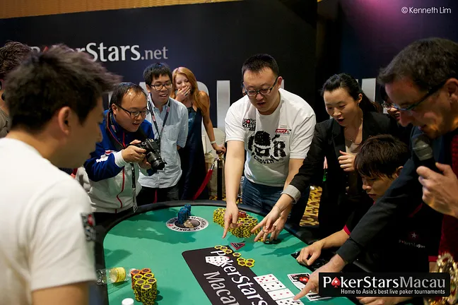 Zhou and Chan during the blind all in for the title in the first ever ACOP Main Event