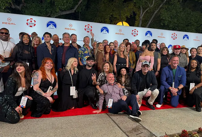 Celebrities pose on the red carpet