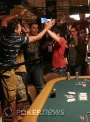 Anthony Rivera celebrates his win with his friends on the rail