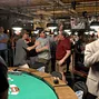 Friends rush in to congratulate the lates WSOP Champion, Mike Eise