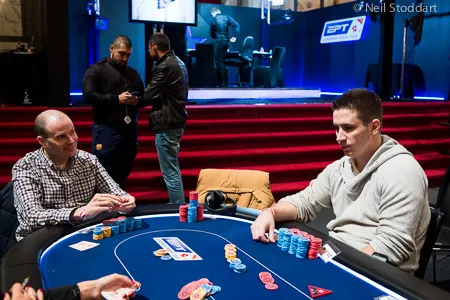 Kovacs (right) tries to burn a hole in the table. Photo courtesy of the PokerStars Blog.