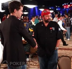Dennis Phillips shakes some hands as he leaves the Main Event.