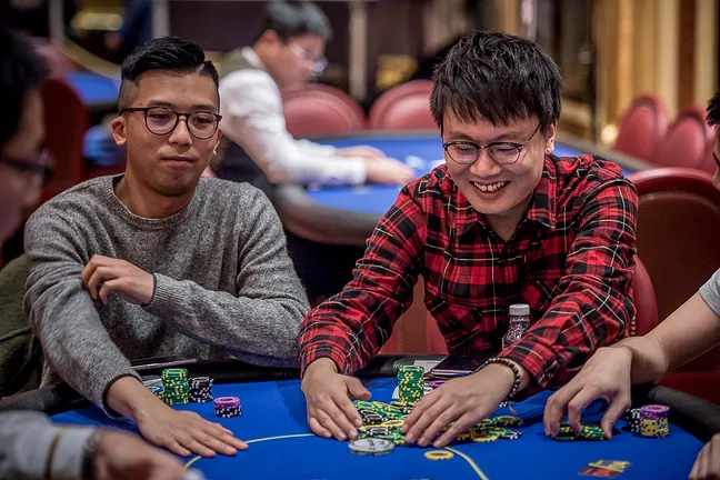 Wei Tso (right) spikes his jack on the river for a huge payday