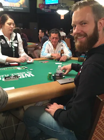 Rinkema happy to see Scotty Nguyen seated across from him, baby!