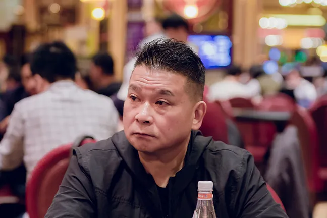 Johnny Chan, without his trademark lucky orange