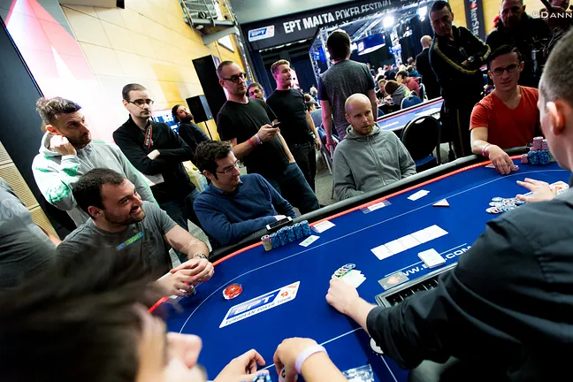 Christopher Andler (grey hoodie) bubbles EPT 12 Malta Main Event 2015